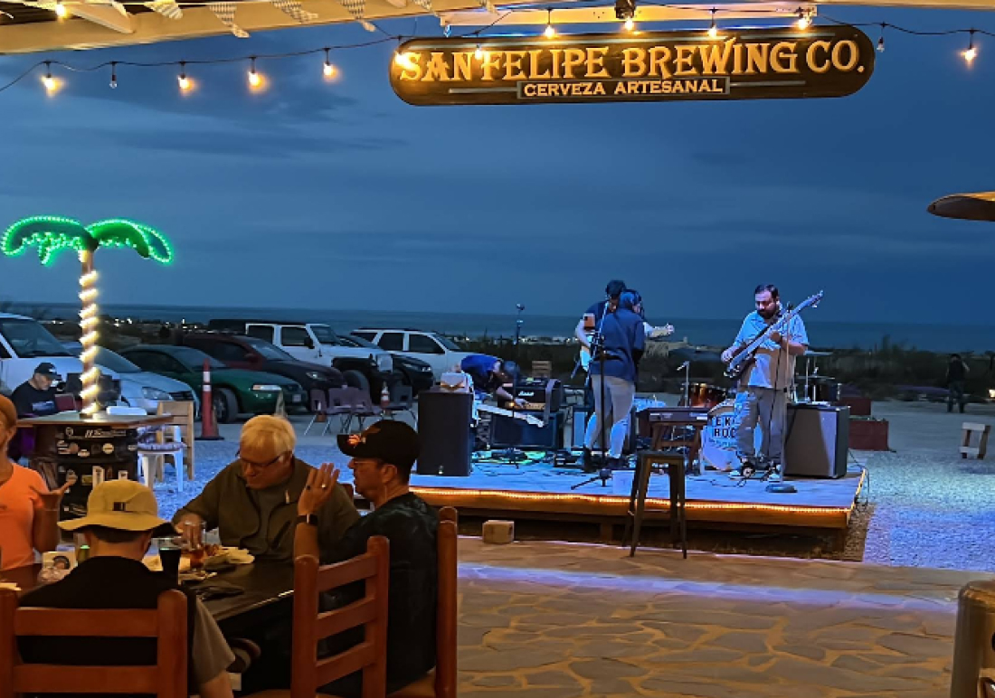 Outdoor patio seating with ocean view at San Felipe Brewing Company